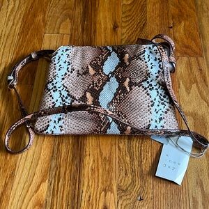 Brand new with tag tan multi colored snakeskin crossbody purse.